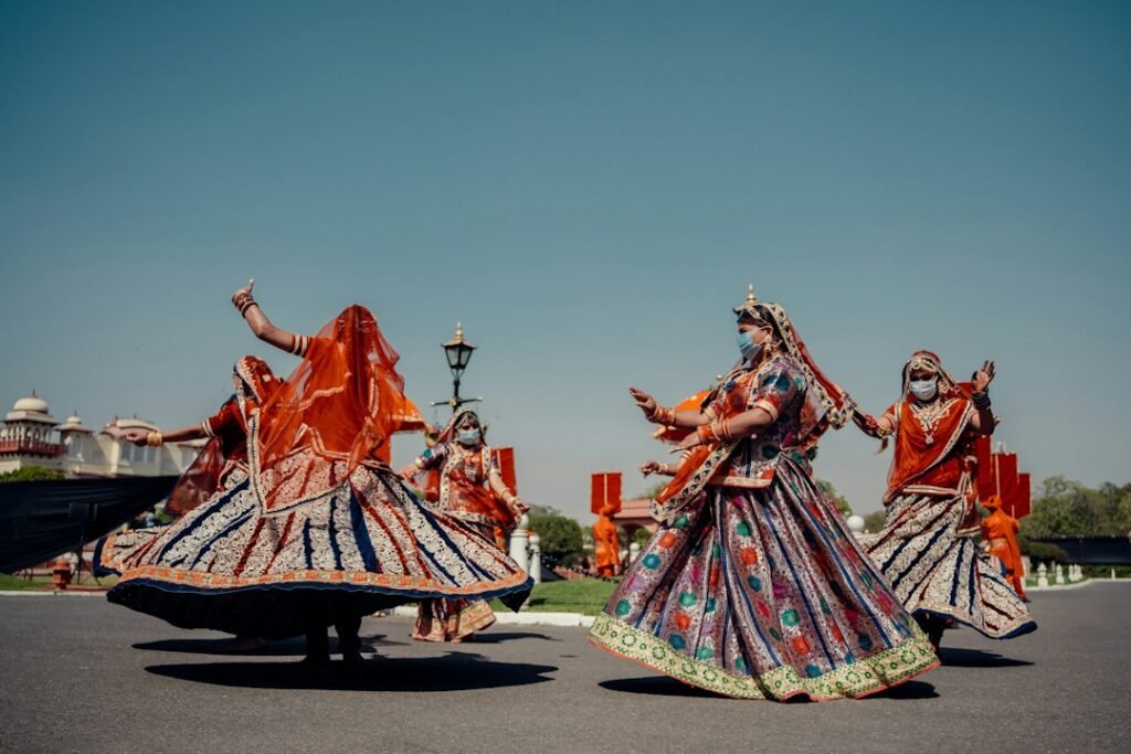 Navratri Events in Vadodara 2026: Garba Nights, Venues, Tickets & Local Guide 2 Garba dancers in traditional dress during Navratri celebrations