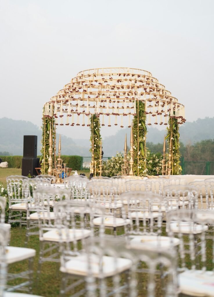 Outdoor wedding ceremony setup with seating and decor
